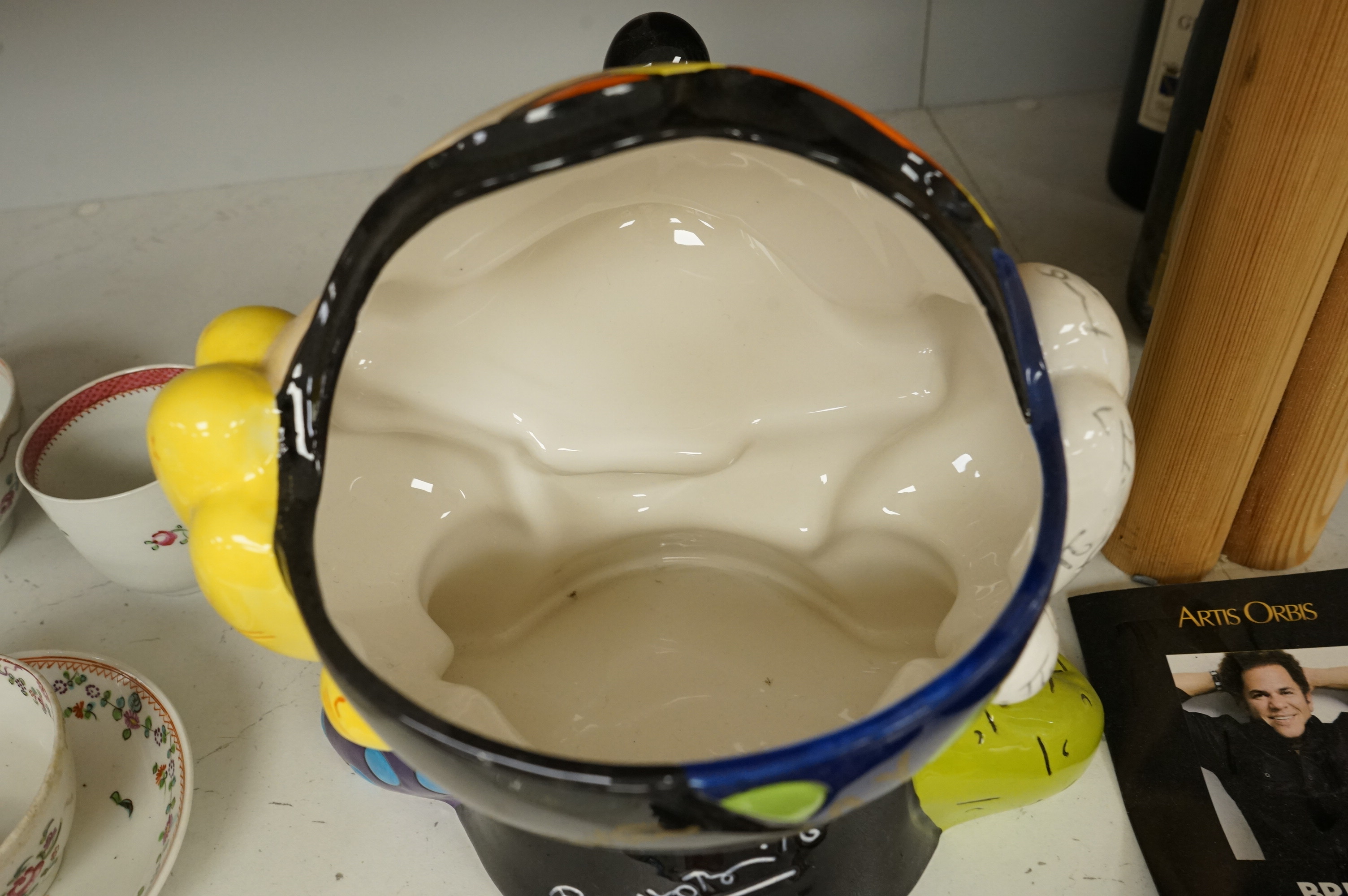Romero Brotto (Brazilian, 1963-), a ceramic Mickey Mouse cookie jar with booklet, lacking cover, 21cm high